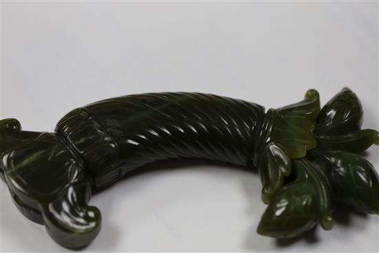 A Mughal spinach jade dagger handle, 5.75in.